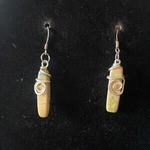 Handmade green stone earrings with silver swirly detailing